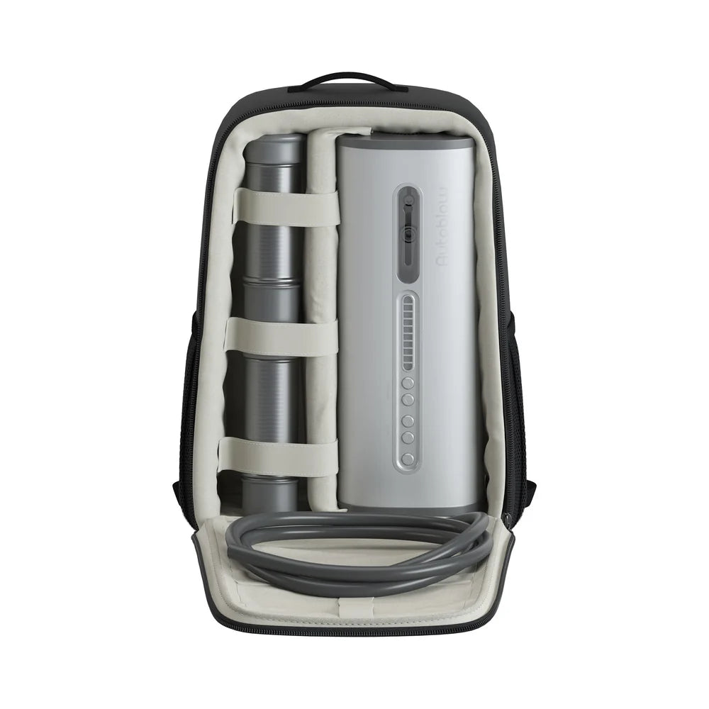 Backpack with electronic male masturbator inside on a white background